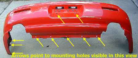 Rear bumper cover (outside) on ground